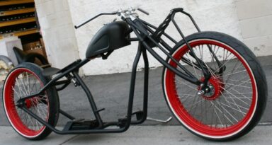 N183 : SCHWINN STYLE TRACKER , 23,23  WHITEWALLS AND LEAF SPRING FORKS